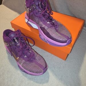 Nike Men’s Purple Athletic Sneakers with Metallic Swoosh
